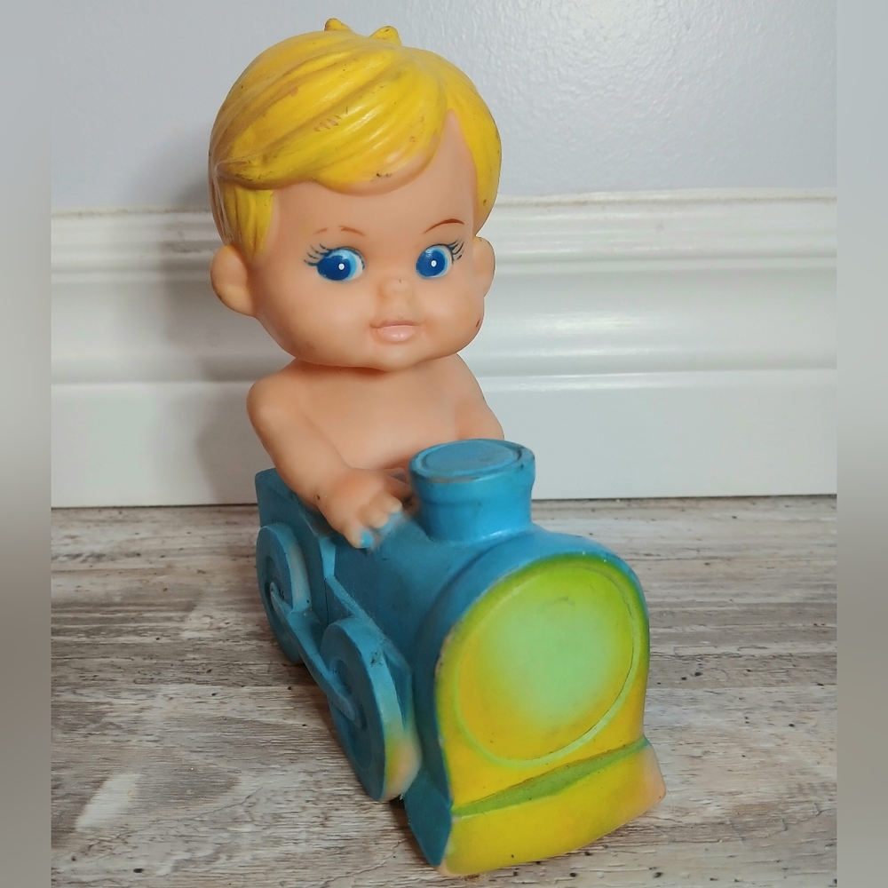 Vintage 1950s–60s Taiwan Rubber Boy Riding Blue Train Squeaky Toy Collectible